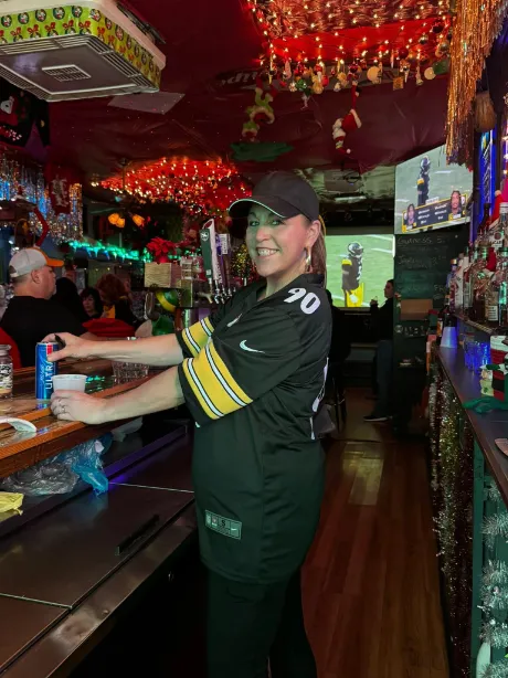 Dana guest bartending at the Jay Jingle Juke Joint